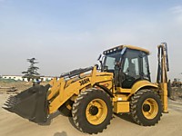 Экскаватор-погрузчик равноколесный Shanmon